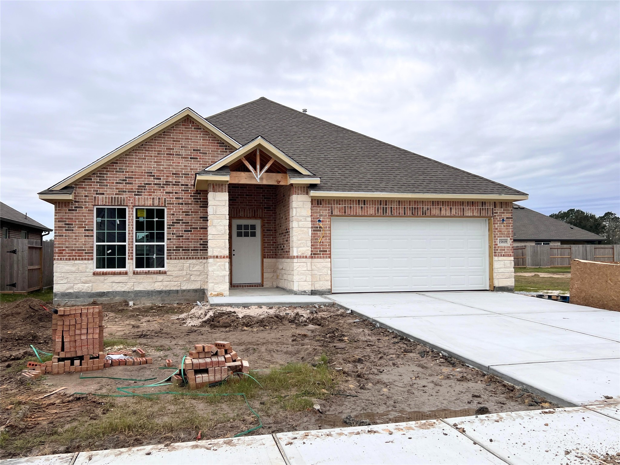 front view of a house with a yard