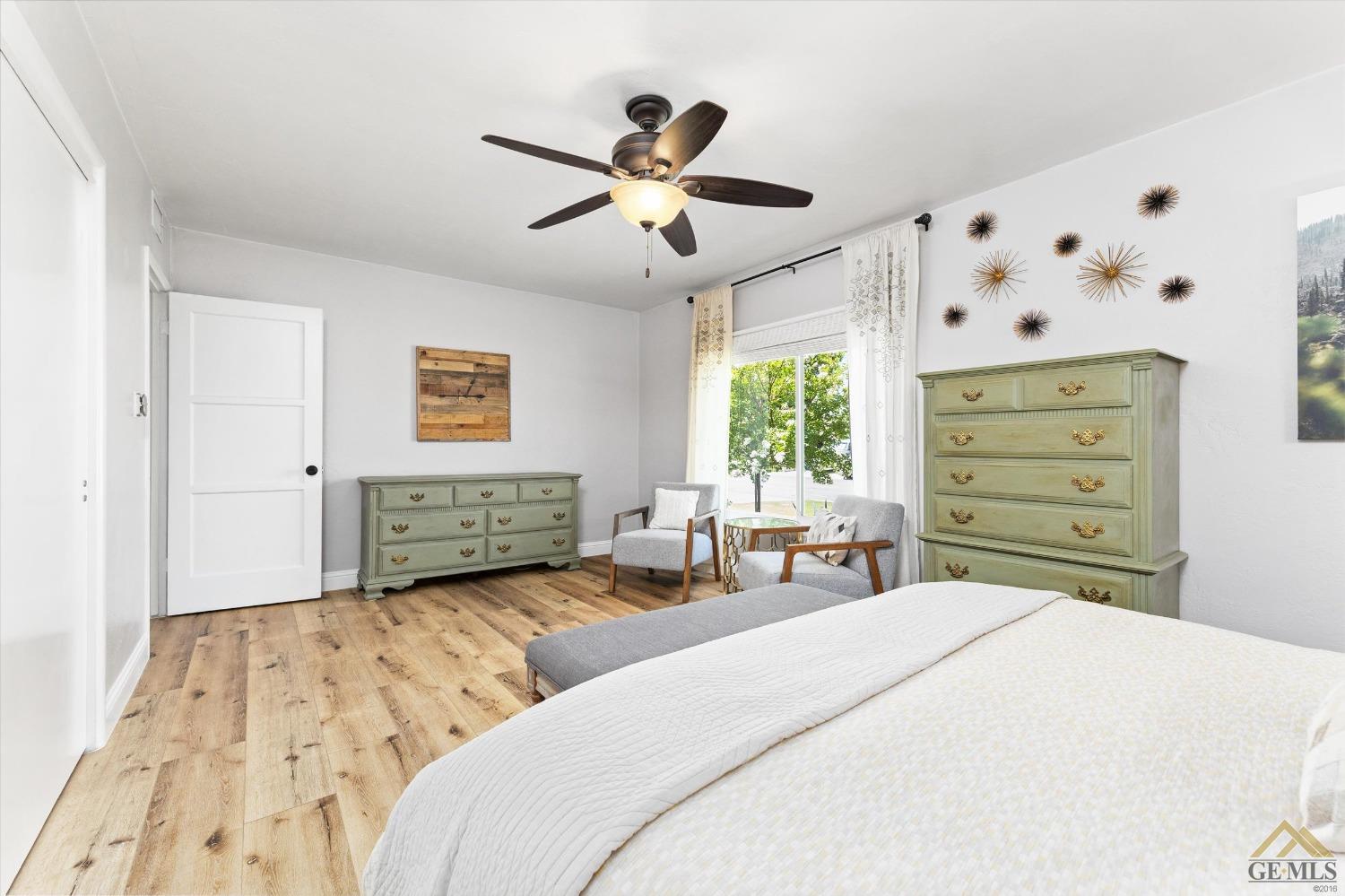 Undisclosed Address Bakersfield, CA 93305 - Photo 26 of 41 a bedroom with a bed and a window