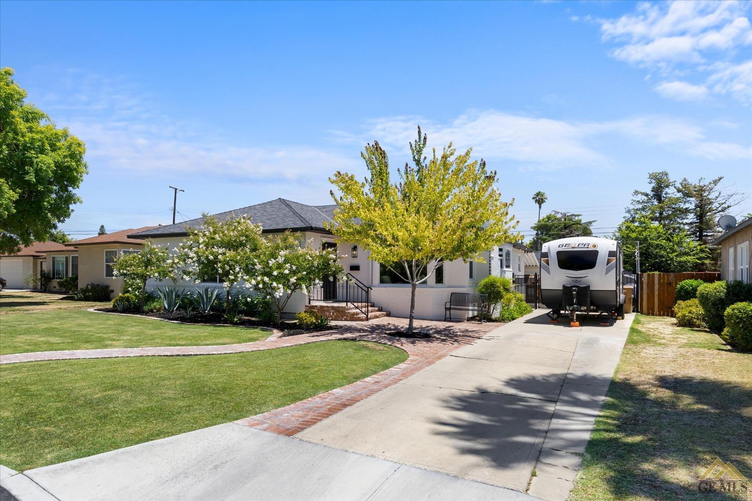 Undisclosed Address Bakersfield, CA 93305 - Photo 3 of 41 a view of a house with a patio