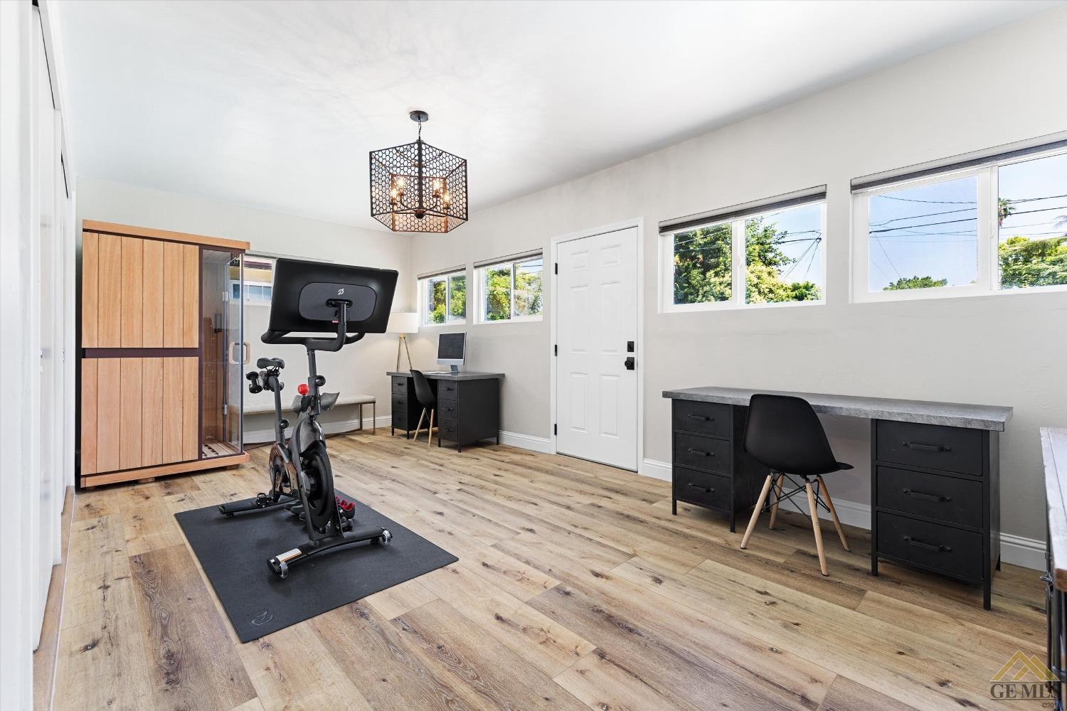 Undisclosed Address Bakersfield, CA 93305 - Photo 32 of 41 a view of a livingroom with furniture and a flat screen tv