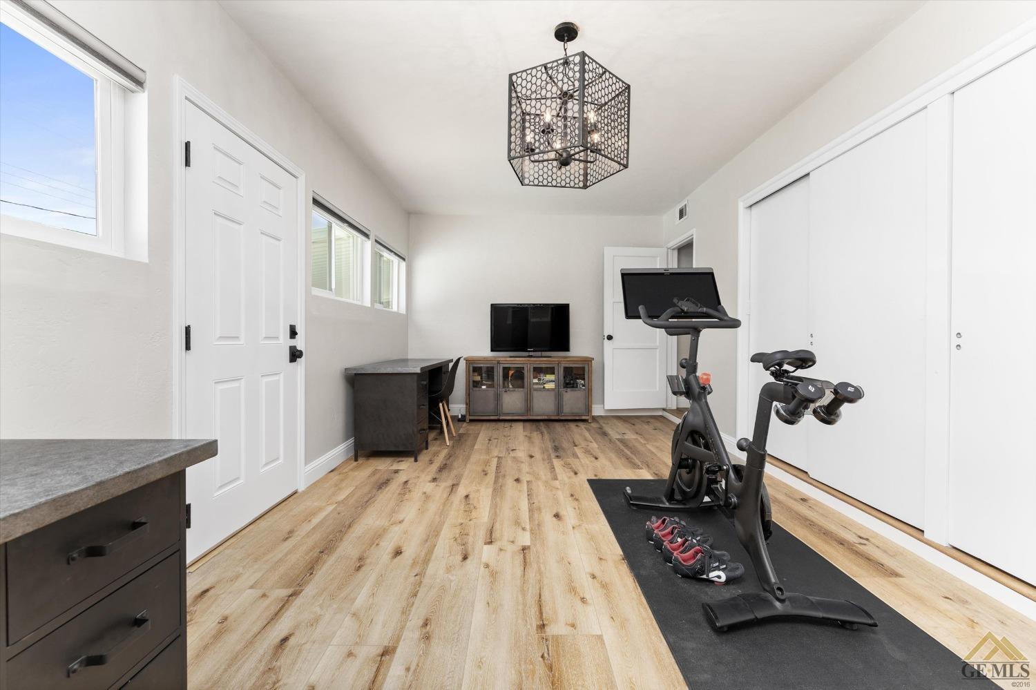 Undisclosed Address Bakersfield, CA 93305 - Photo 33 of 41 a room with furniture and a flat screen tv