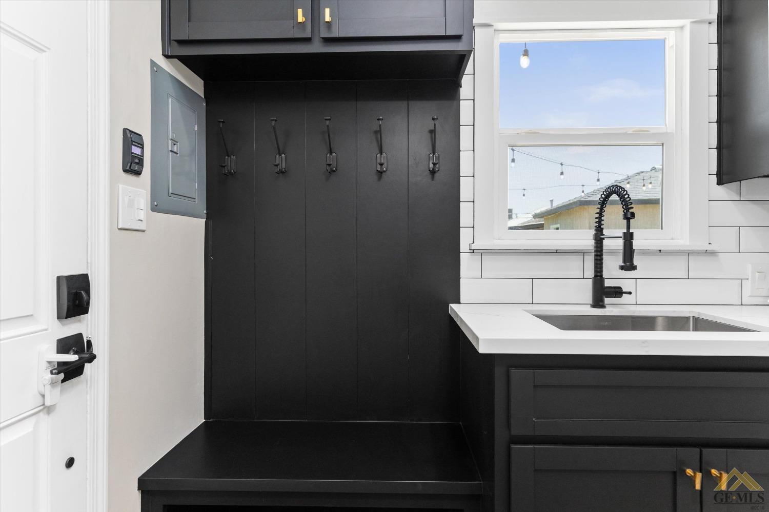 Undisclosed Address Bakersfield, CA 93305 - Photo 35 of 41 a bathroom with a sink and a mirror