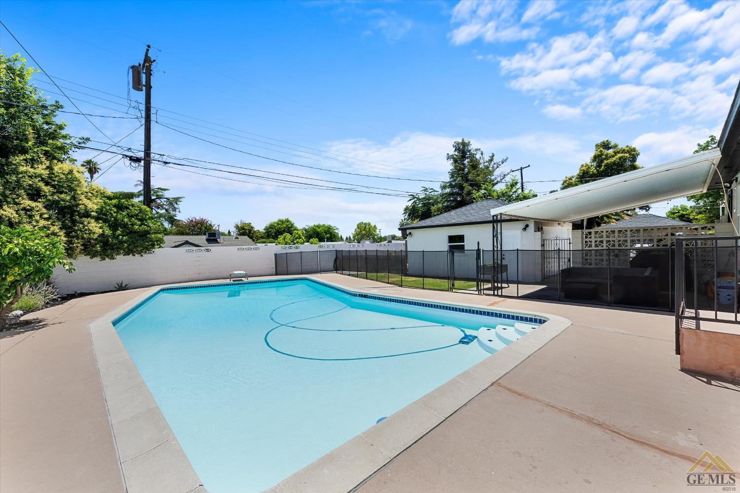 Undisclosed Address Bakersfield, CA 93305 - Photo 36 of 41 a view of a swimming pool with a patio