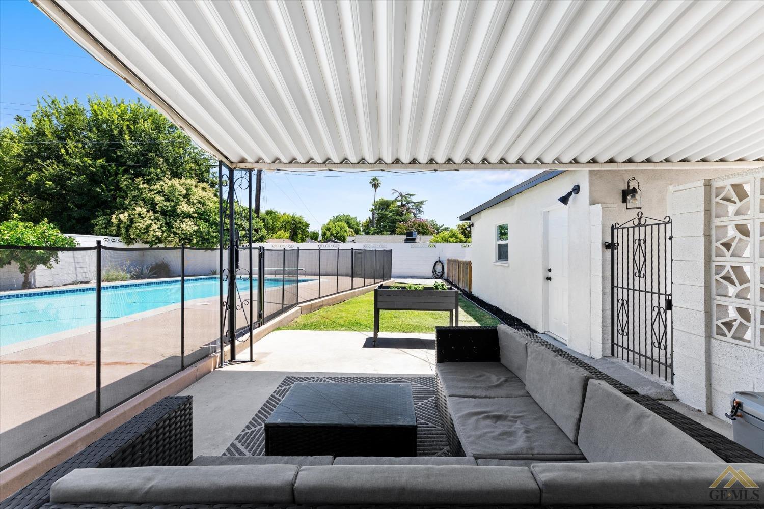 Undisclosed Address Bakersfield, CA 93305 - Photo 39 of 41 a view of a swimming pool with a couches