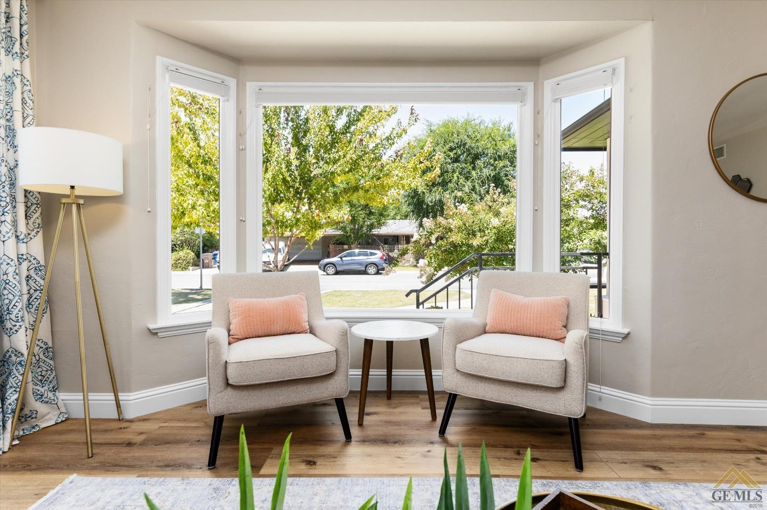 Undisclosed Address Bakersfield, CA 93305 - Photo 10 of 41 a living room with furniture and a window