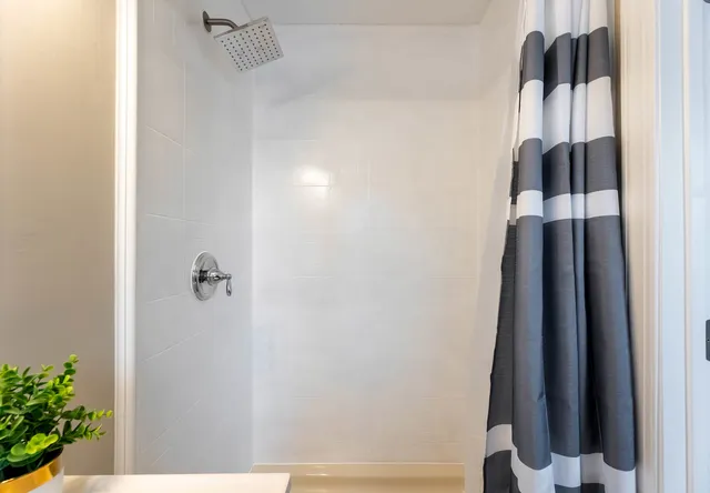 a view of bathroom with a shower