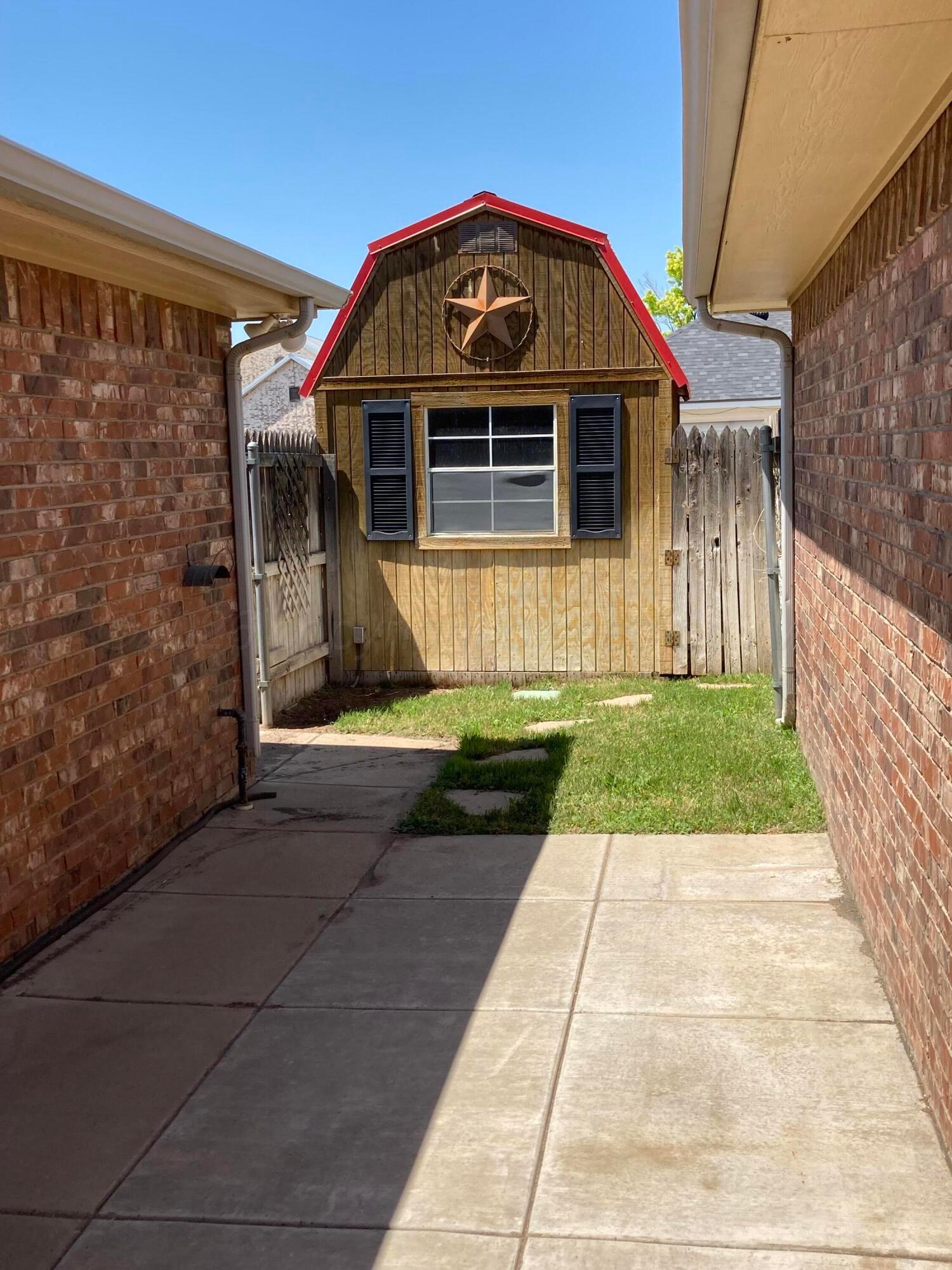 3509 West Point Drive Amarillo, TX 79121 - Photo 10 of 10 a front view of a house with a yard