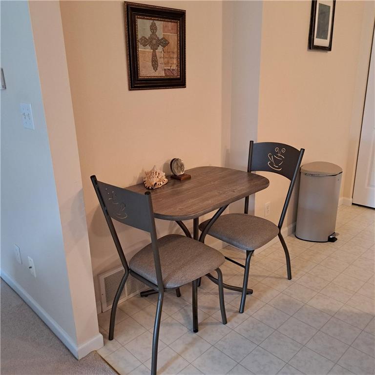 304 Acre Avenue Butler, PA 16001 - Photo 3 of 21 a view of a dining room with furniture and wooden floor