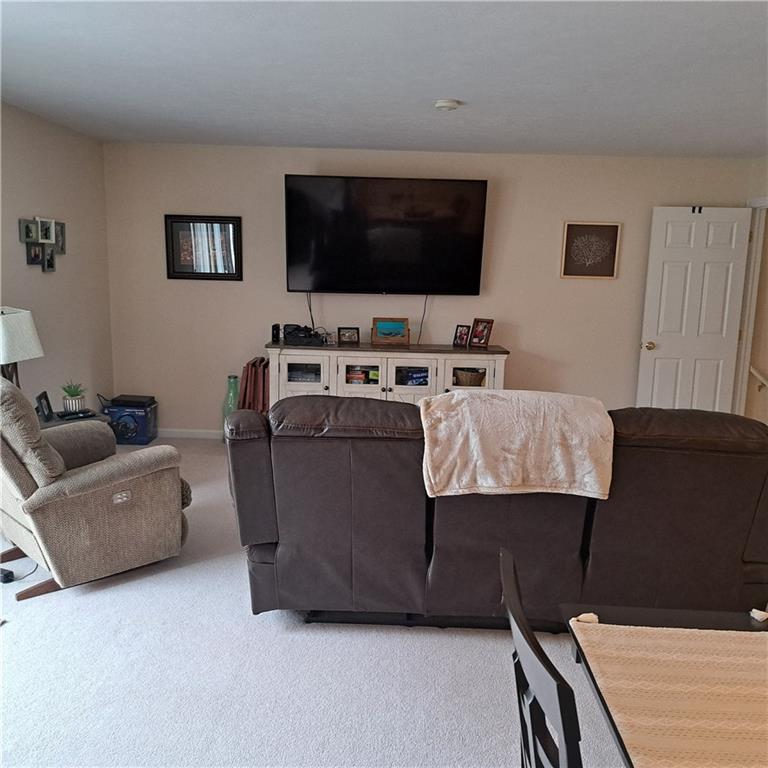 304 Acre Avenue Butler, PA 16001 - Photo 6 of 21 a living room with furniture and a flat screen tv