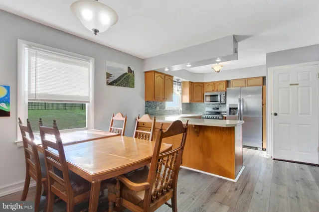 a view of an empty room and entryway