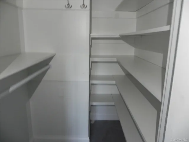 a bathroom with a shower and a sink