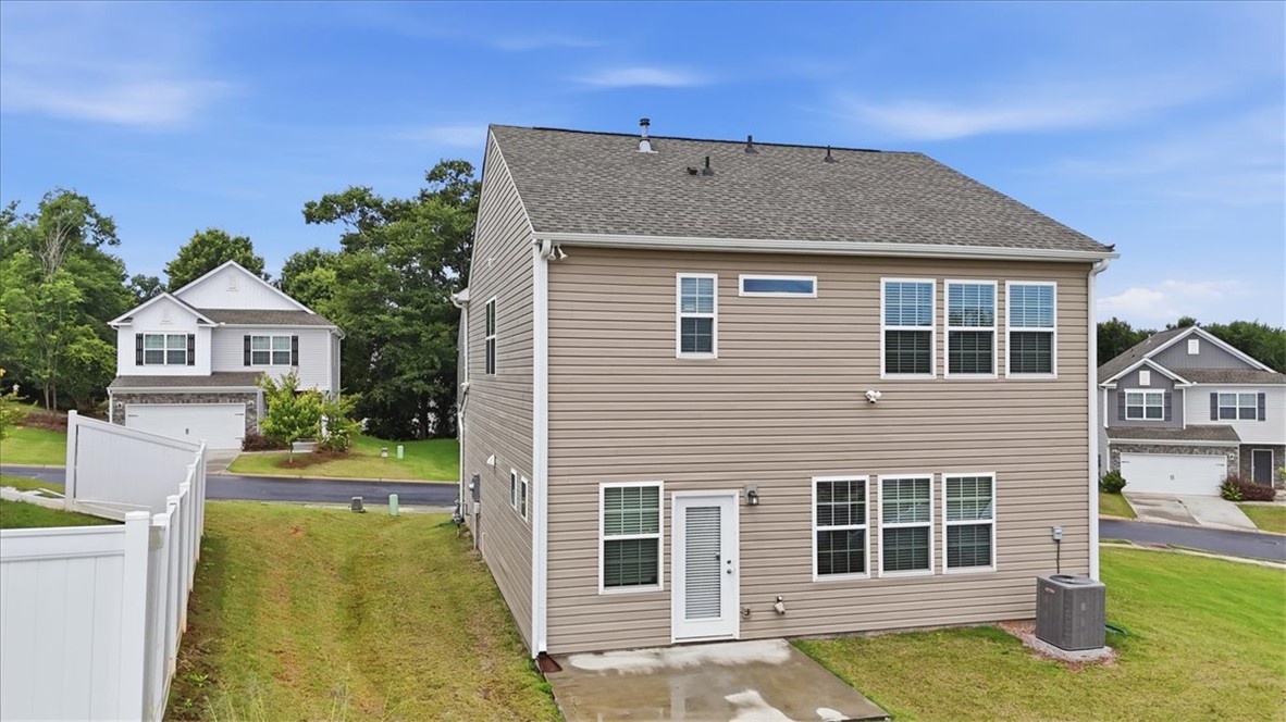 365 Sliding Rock Drive Pendleton, SC 29670 - Photo 36 of 46 A classic two-story residence with a neutral exterior and a neatly maintained yard.