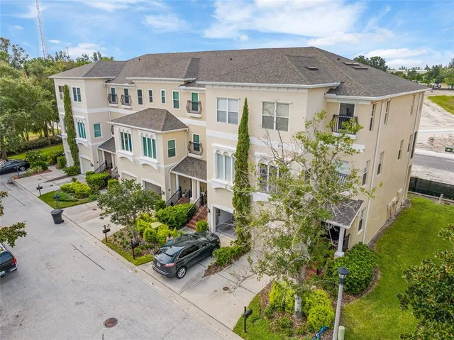 front view of a house with a garden