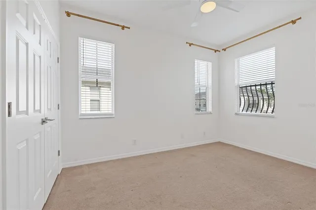 an empty room with windows