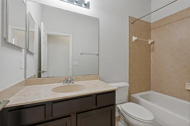 an aerial view of a house with a garden