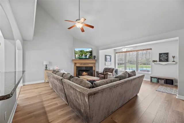 a living room with furniture and a window
