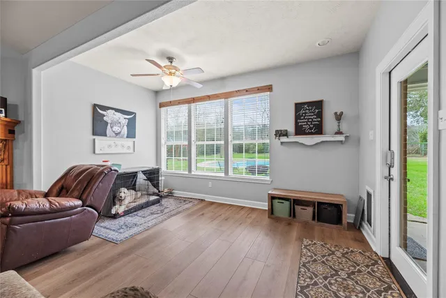 a work room with furniture and book shelf