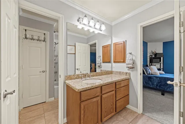 a bedroom with bed and window