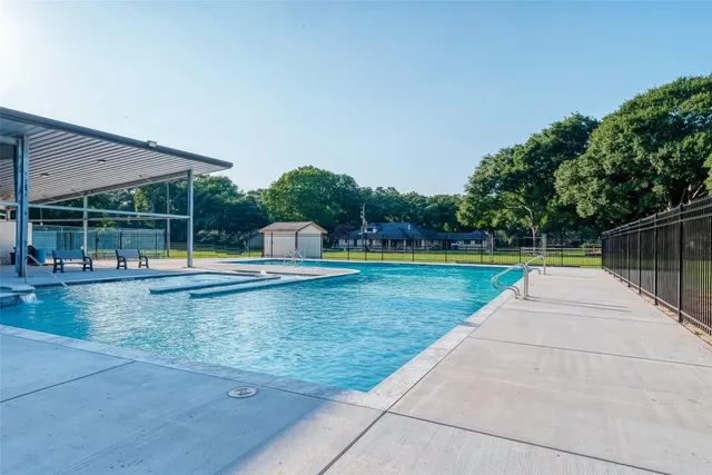 a picture of a bathroom with a mirror