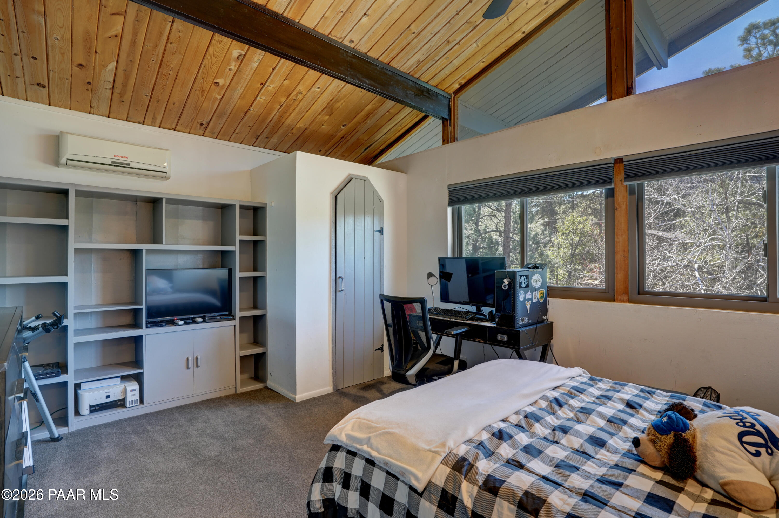 1963 Idylwild Road Prescott, AZ 86305 - Photo 18 of 54 a bedroom with a bed and a table in it