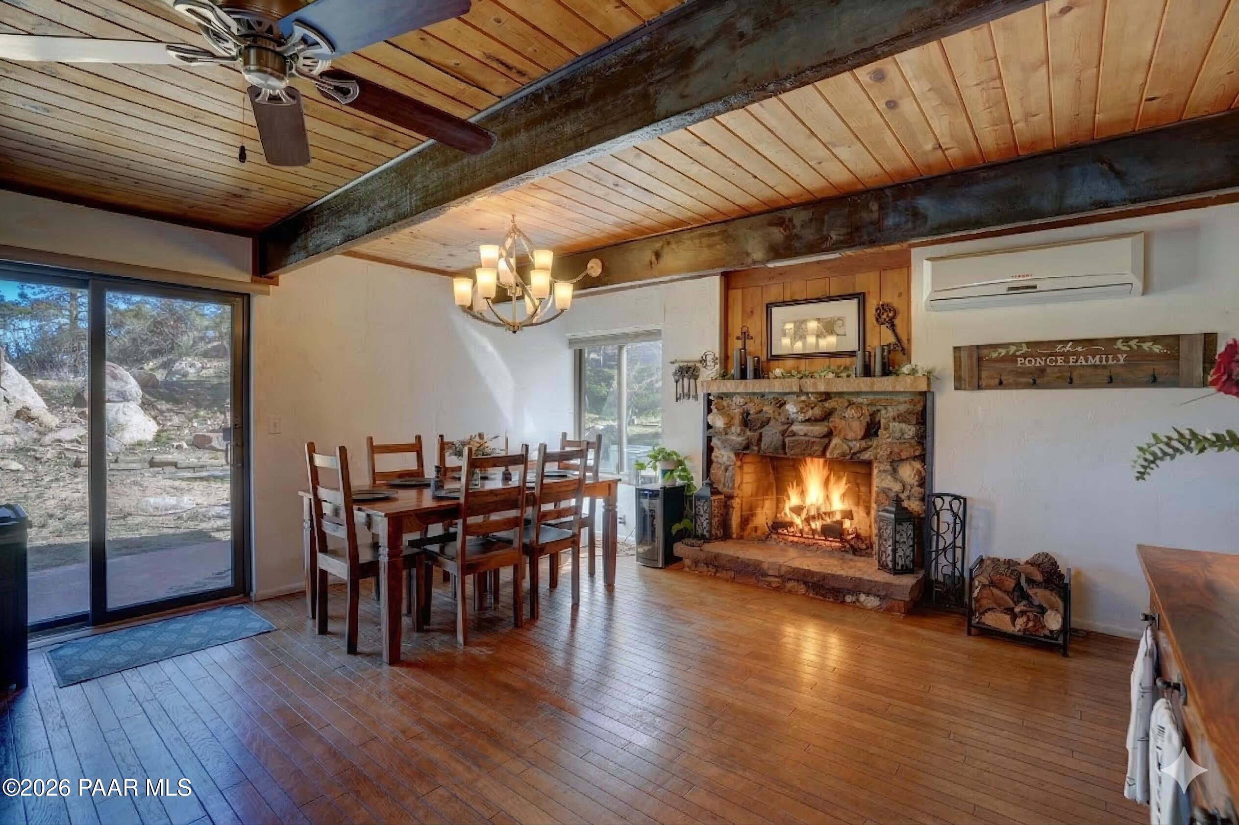 1963 Idylwild Road Prescott, AZ 86305 - Photo 8 of 54 a view of a dining room with furniture window and wooden floor