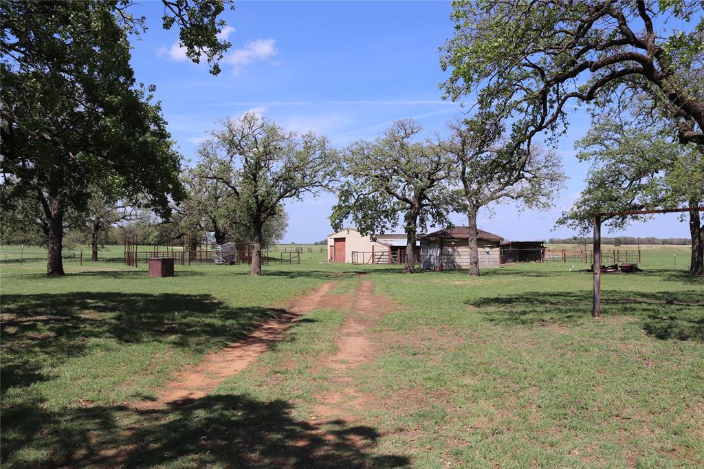 2553 Brixey Road Henrietta, TX 76365 - Photo 11 of 32 a view of a house with a yard
