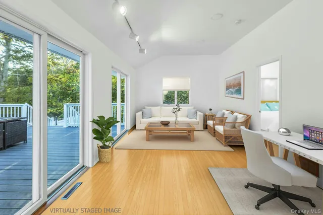 a living room with furniture and a table