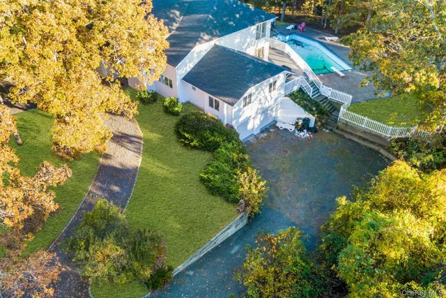view of a house with a yard