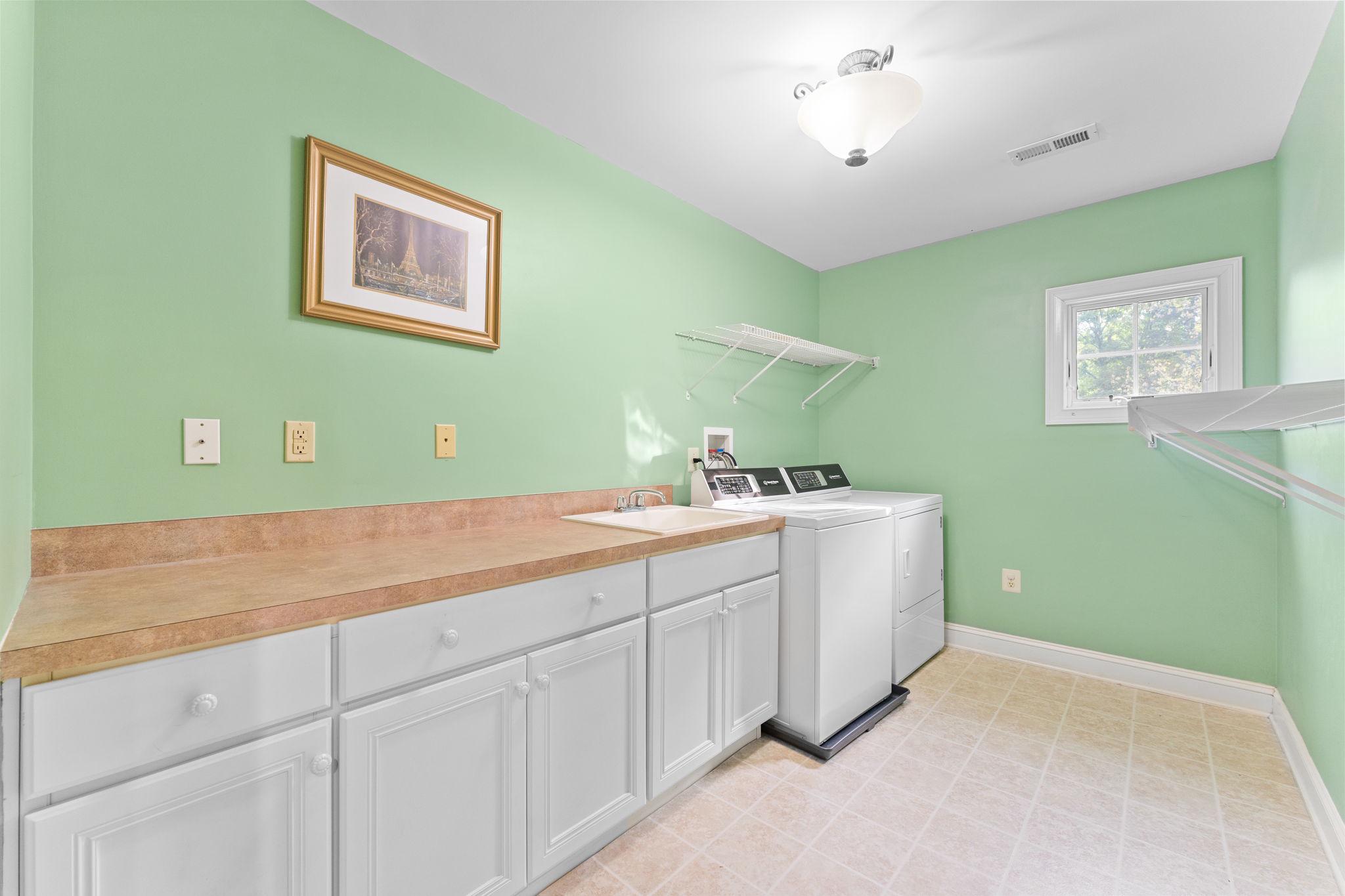 912 Ashbourne Way Schwenksville, PA 19473 - Photo 35 of 45 Large LAUNDRY ROOM on second floor