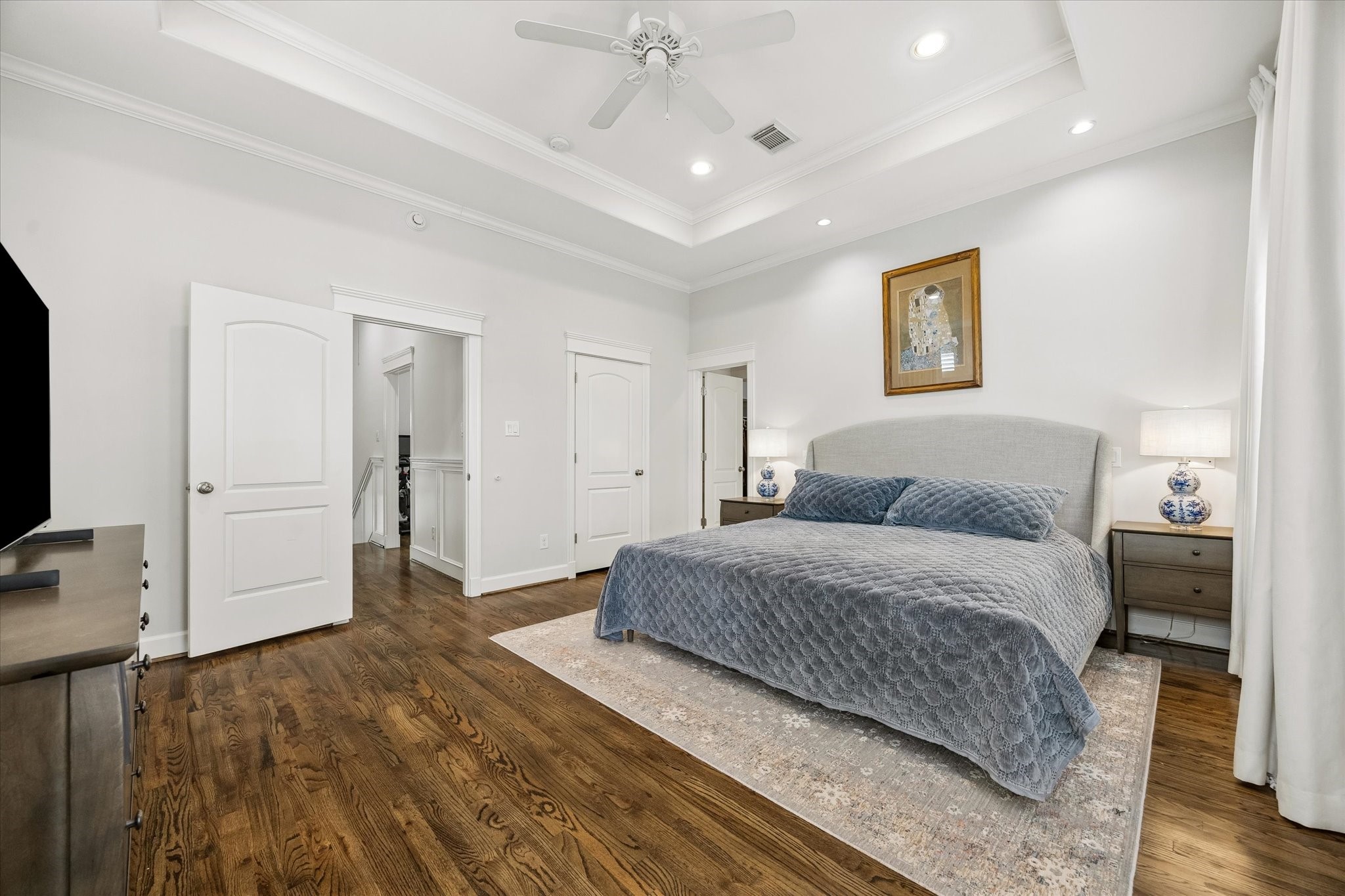 609 Rutland Street, Unit A Houston, TX 77007 - Photo 16 of 30 a spacious bedroom with a bed and a view of bathroom