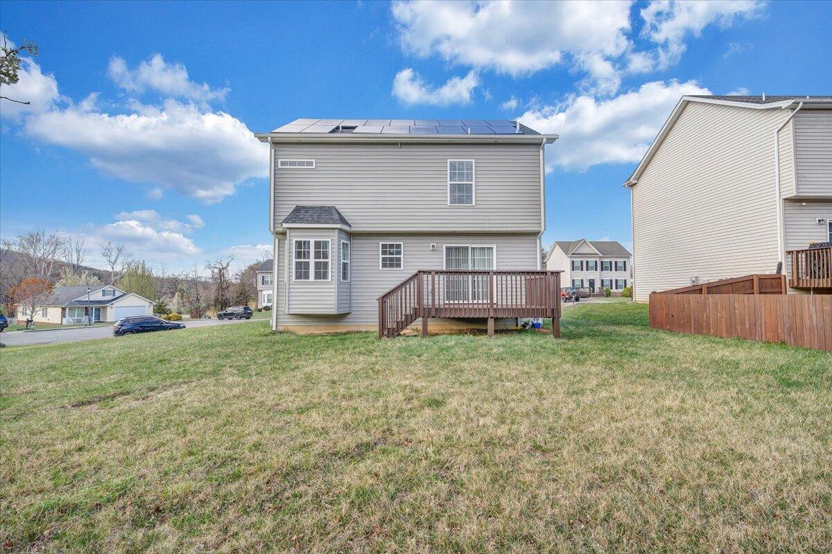 427 Cambridge Ct Road Vinton, VA 24179 - Photo 40 of 46 a view of a house with a back yard