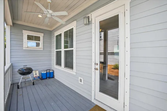 a view of a house with porch and wooden floor