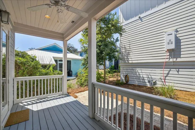 a view of a porch with wooden floor