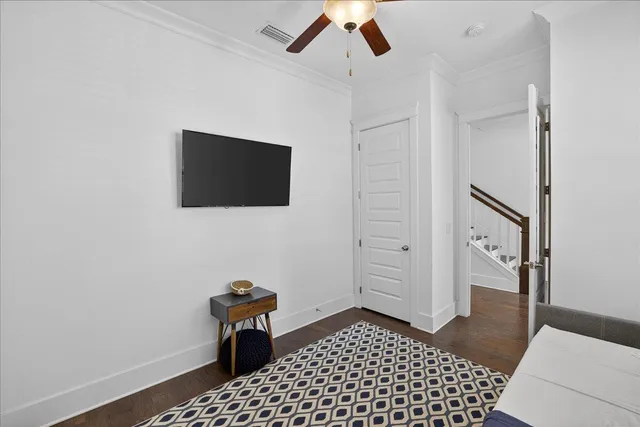 a view of a livingroom with wooden floor