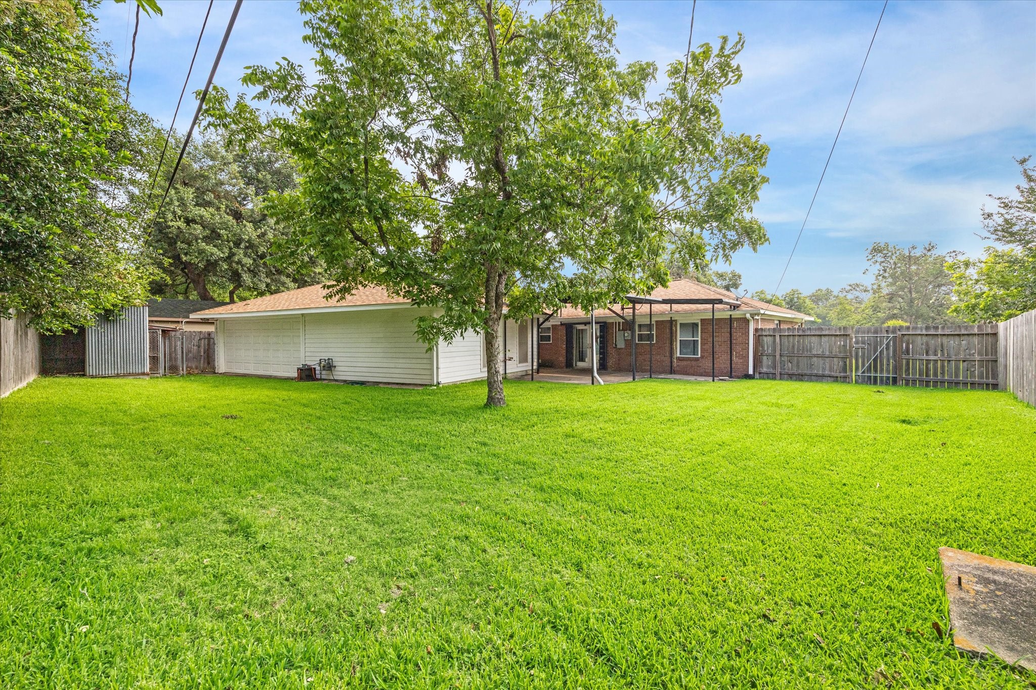 3613 Lazy Spring Drive Houston, TX 77080 - Photo 19 of 22 a front view of house with a garden