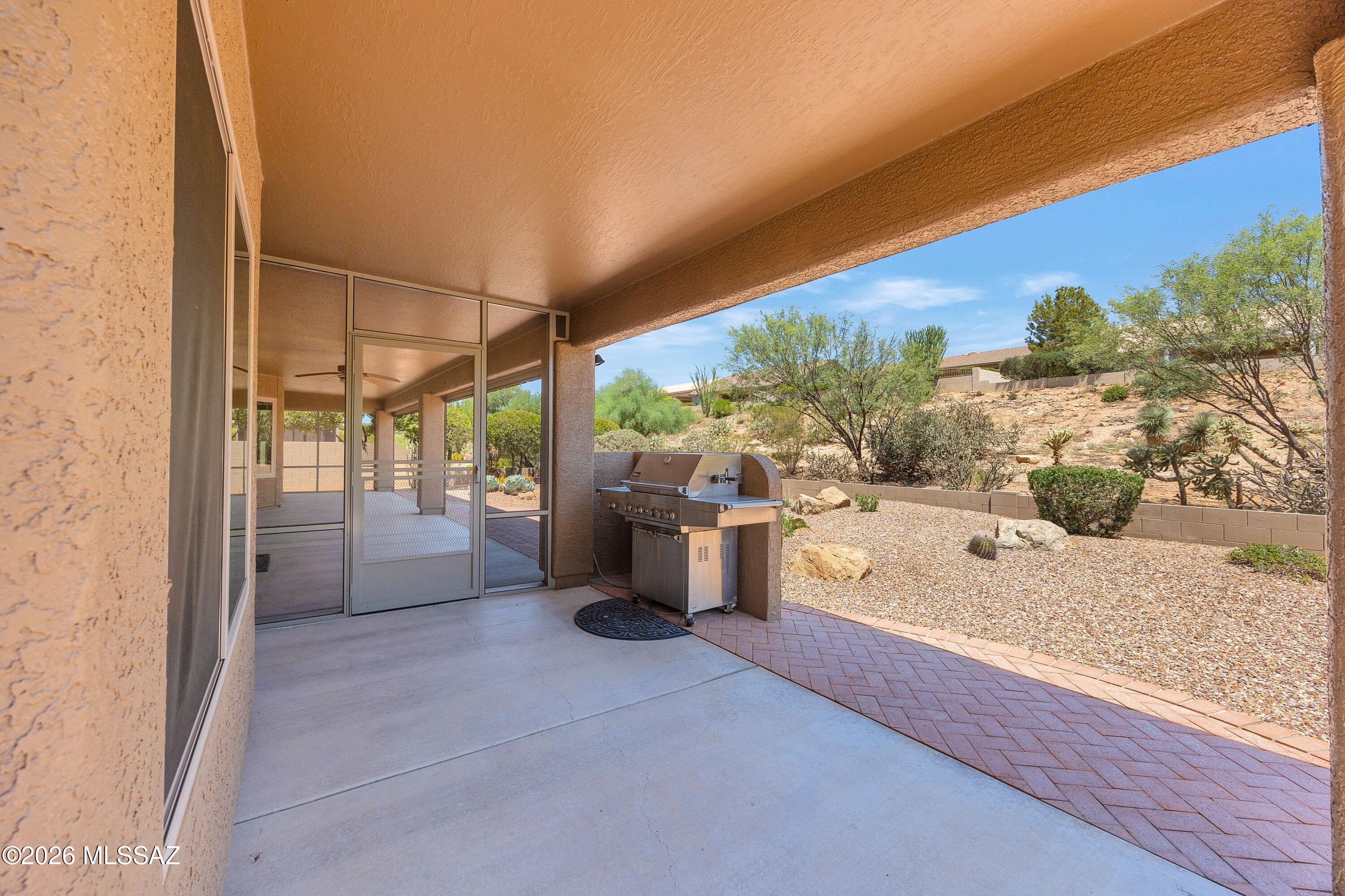 62574 East Northwood Road Tucson, AZ 85739 - Photo 34 of 50 Screen Door other end & BBQ Area
