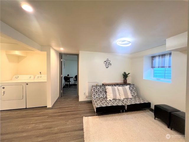 a living room with furniture and a table