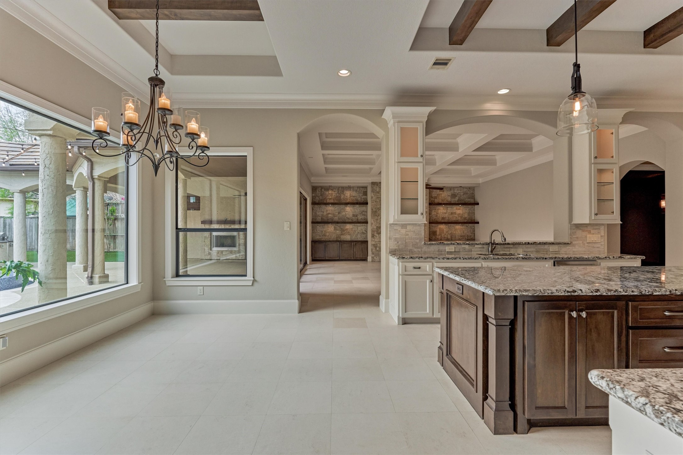 25 Post Shadow Estate Drive Spring, TX 77389 - Photo 11 of 49 a view of a kitchen with a sink and a large window