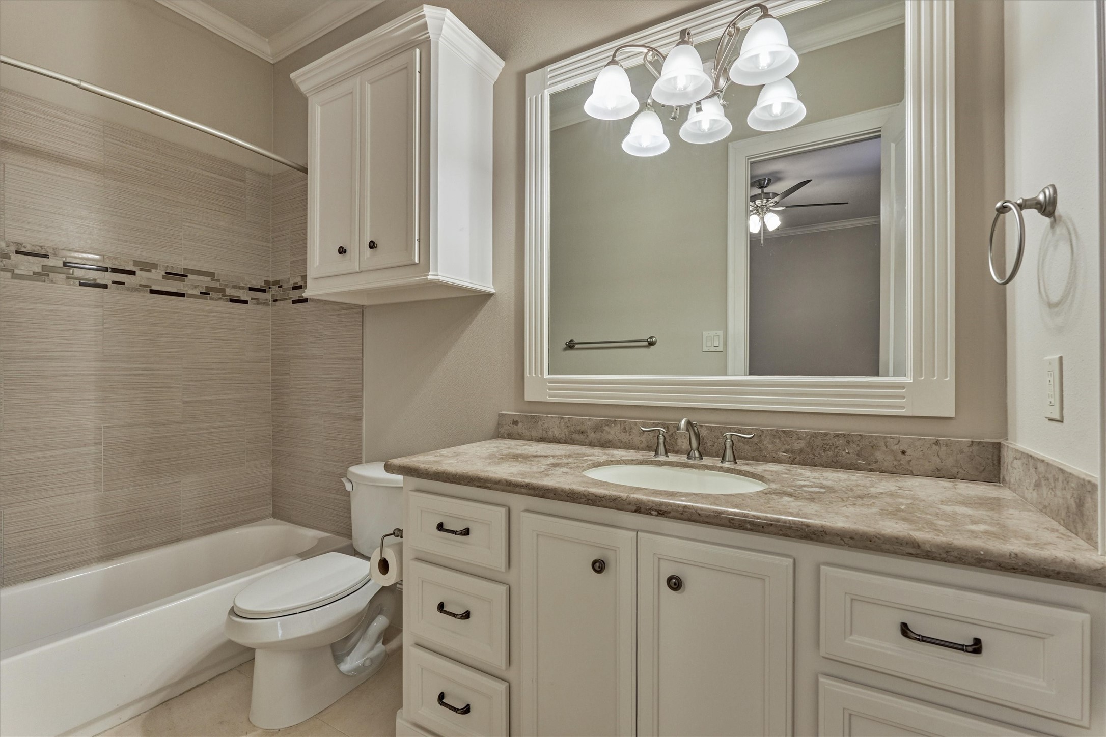 25 Post Shadow Estate Drive Spring, TX 77389 - Photo 31 of 49 a bathroom with a granite countertop sink a toilet and shower