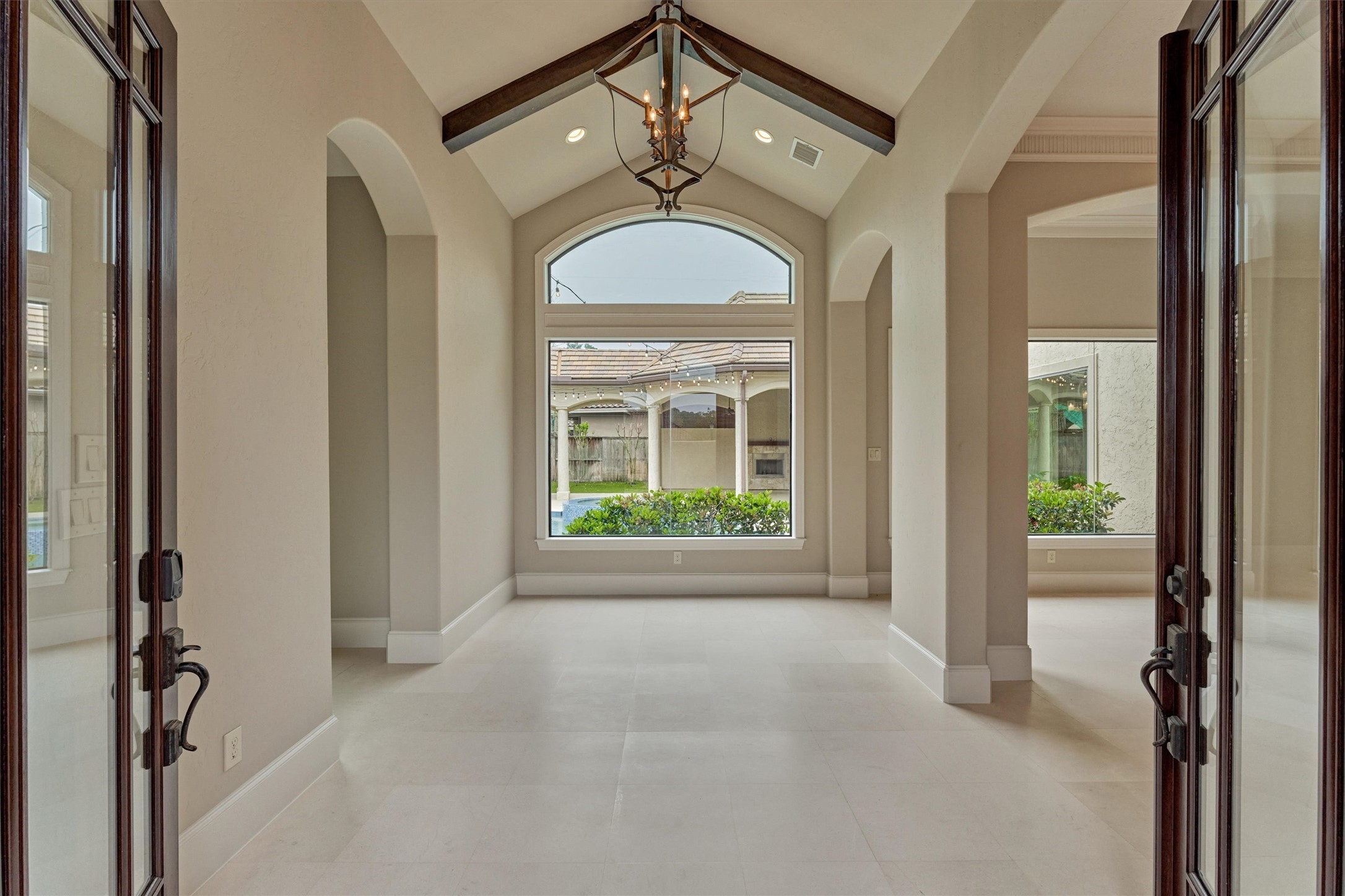 25 Post Shadow Estate Drive Spring, TX 77389 - Photo 6 of 49 a view of a hallway with windows