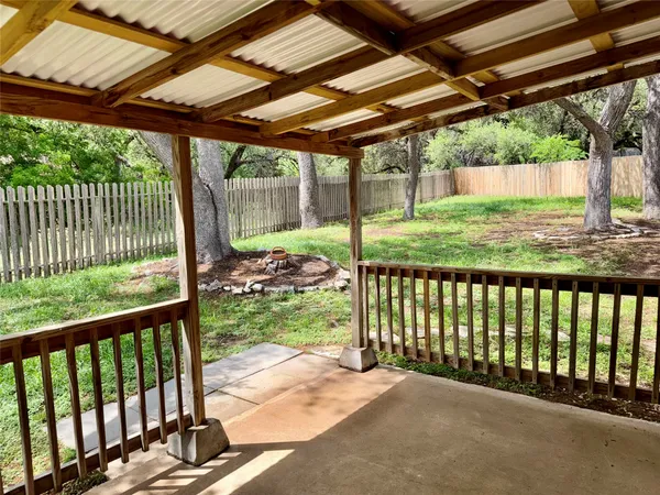 a view of a porch with a yard