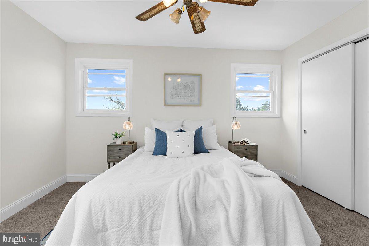 8303 Navahoe Drive Silver Spring, MD 20903 - Photo 20 of 39 a bedroom with a bed and a window