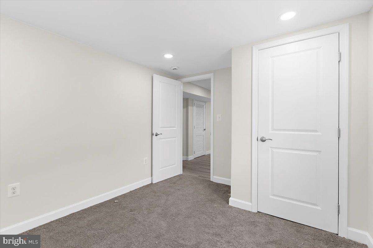 8303 Navahoe Drive Silver Spring, MD 20903 - Photo 30 of 39 a view of hallway with closet