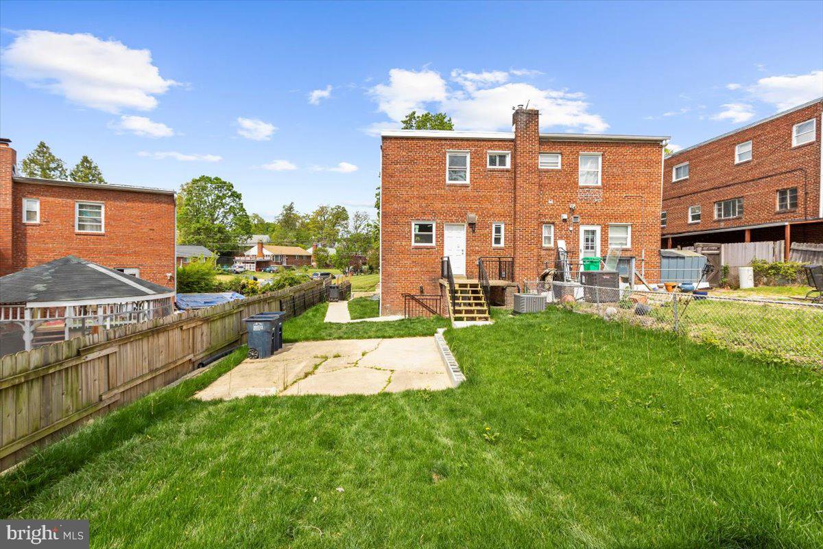 8303 Navahoe Drive Silver Spring, MD 20903 - Photo 36 of 39 a view of a front of a house with a yard