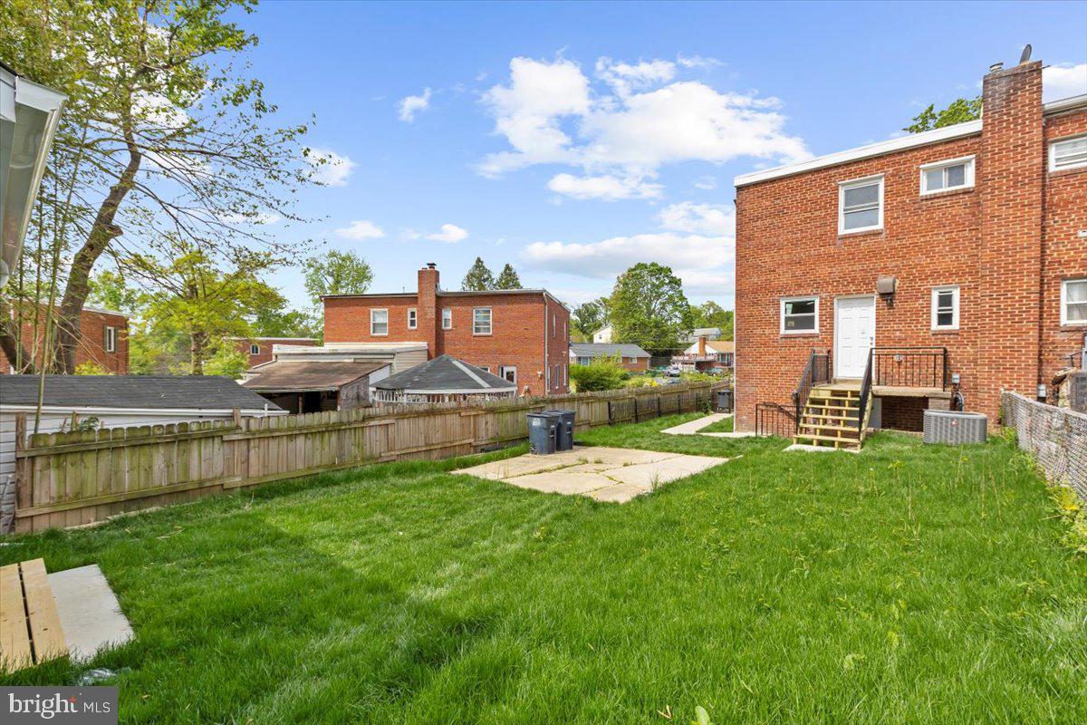 8303 Navahoe Drive Silver Spring, MD 20903 - Photo 37 of 39 a view of a backyard with sitting area