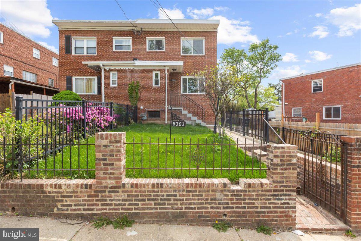 8303 Navahoe Drive Silver Spring, MD 20903 - Photo 38 of 39 a view of a house with a garden and plants
