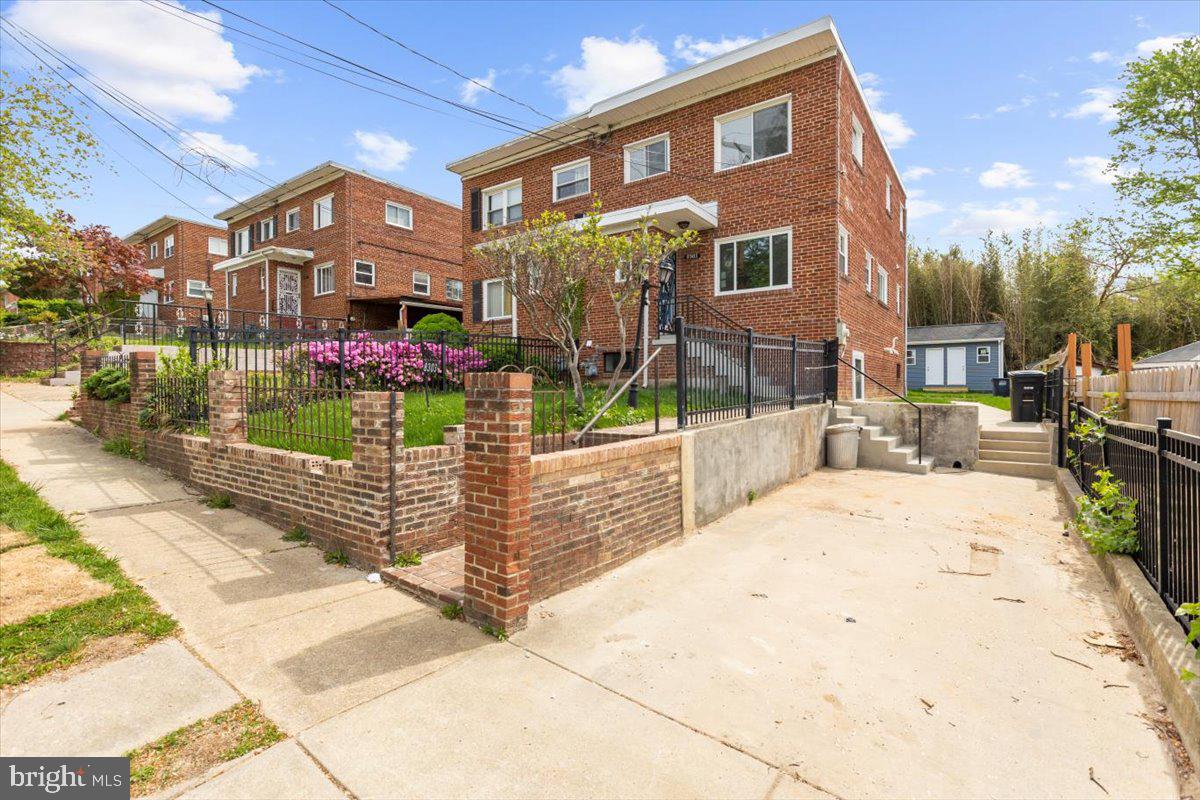8303 Navahoe Drive Silver Spring, MD 20903 - Photo 39 of 39 a front view of a building with street view