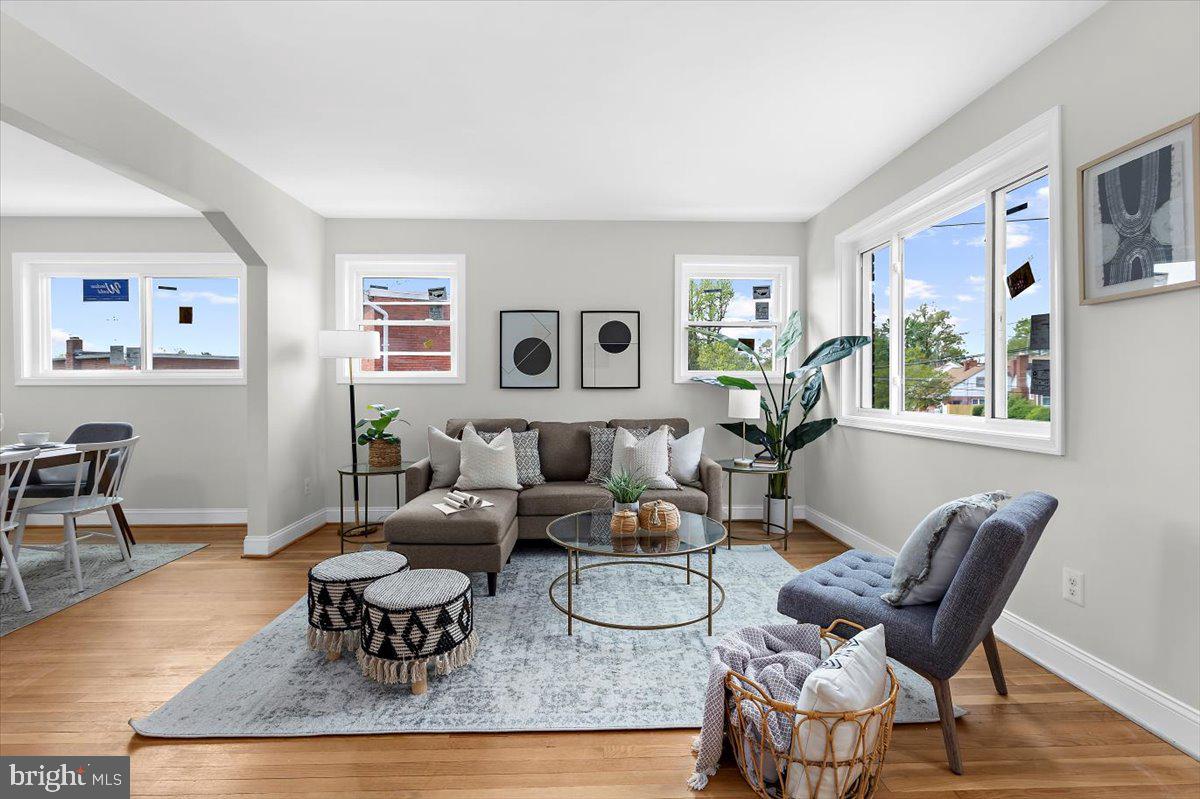 8303 Navahoe Drive Silver Spring, MD 20903 - Photo 4 of 39 a living room with furniture and wooden floor