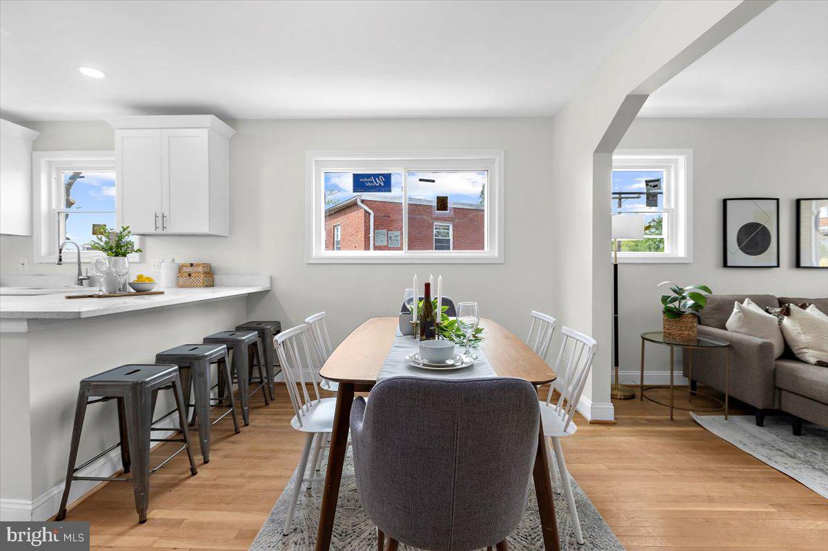 8303 Navahoe Drive Silver Spring, MD 20903 - Photo 9 of 39 a view of a dining room with furniture