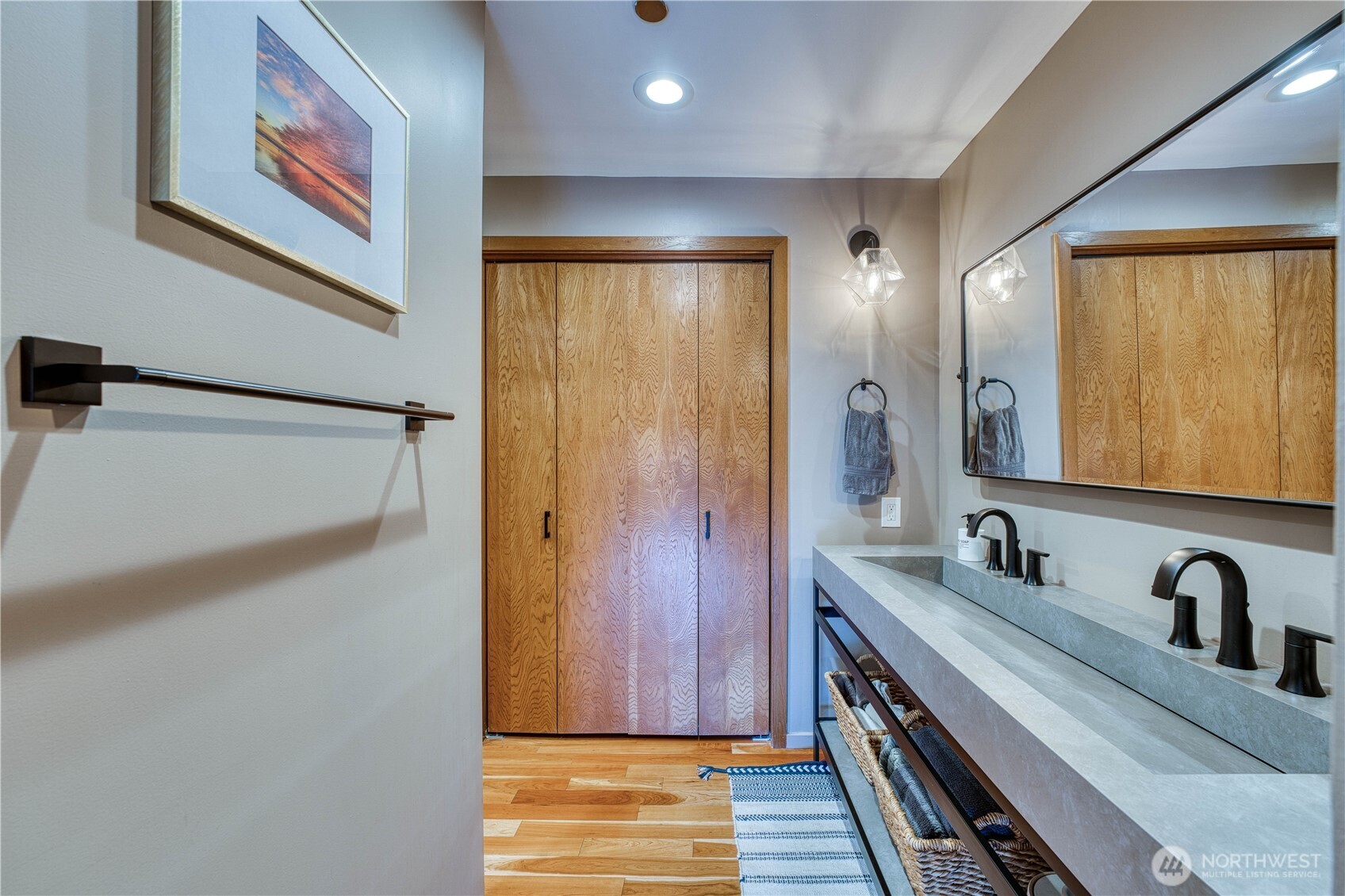 507 North 3rd Street, Unit 101 Tacoma, WA 98403 - Photo 21 of 33 a bathroom with a sink and a mirror